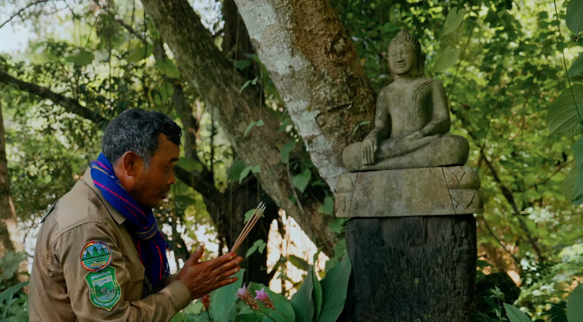 He is praying to his ancestral.