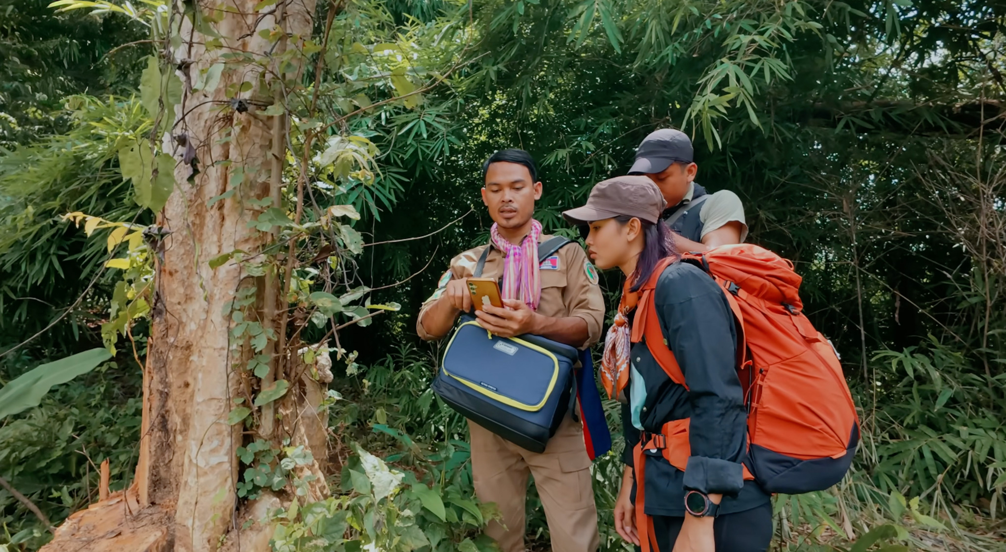 He is recording the illegal logging activities in to SMART